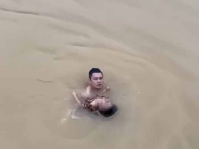 Đề nghị khen thưởng người đàn ông lao xuống sông cứu bé gái bị đuối nước ở Quảng Trị- Ảnh 1. Đề nghị khen thưởng người đàn ông lao xuống sông cứu bé gái bị đuối nước ở Quảng Trị- Ảnh 1.