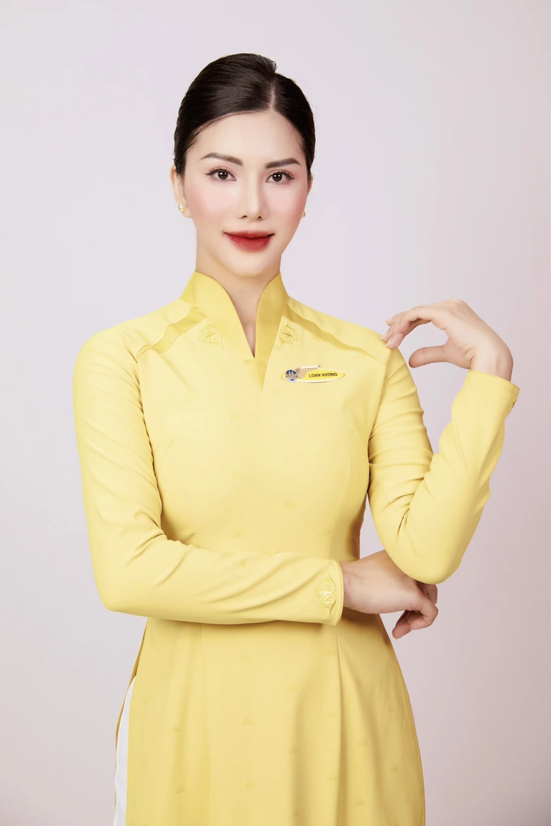 Ngắm nhan sắc "Hoa hậu h&agrave;ng kh&ocirc;ng" Loan Vương qua trang phục &aacute;o d&agrave;i- Ảnh 10.