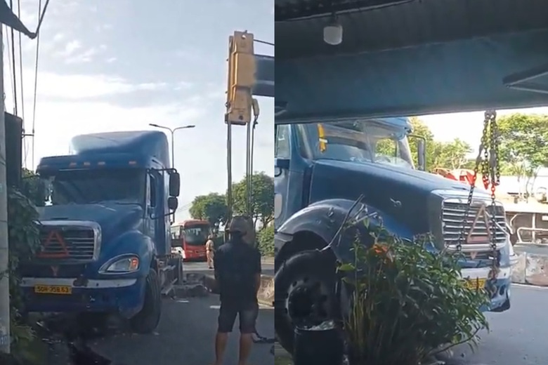 TP.HCM: Xe container t&ocirc;ng dải ph&acirc;n c&aacute;ch, lao v&agrave;o nh&agrave; d&acirc;n- Ảnh 1.