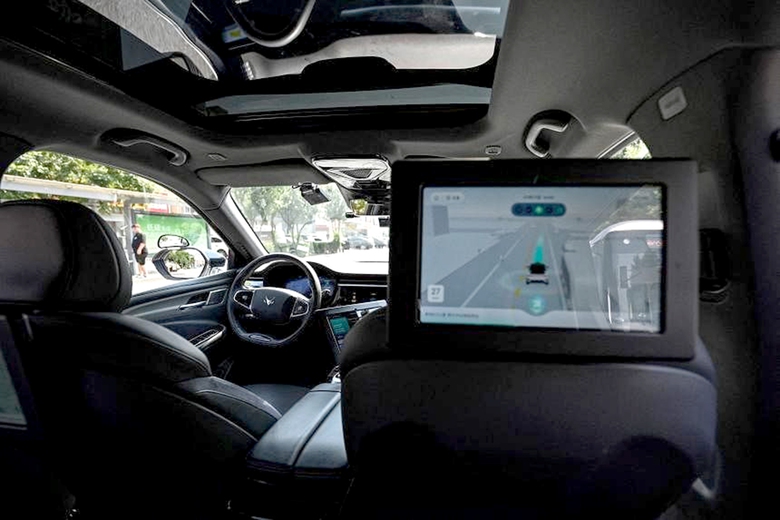 Trung Quốc:&nbsp;Taxi truyền thống lo mất kh&aacute;ch v&igrave; nở rộ xe tự l&aacute;i- Ảnh 2.