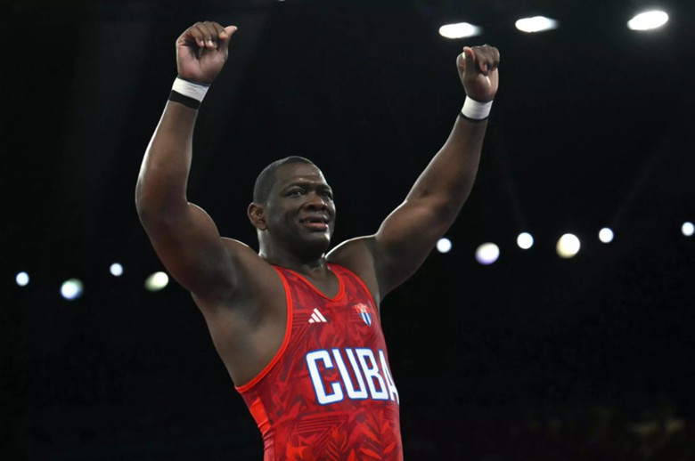 Cậu b&eacute; n&ocirc;ng d&acirc;n đi v&agrave;o lịch sử Olympic- Ảnh 1.