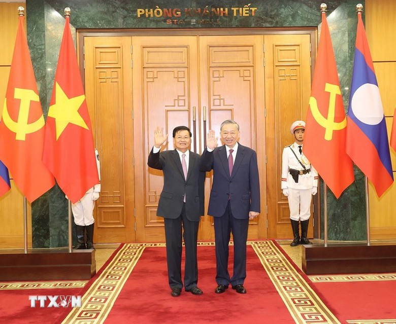 Việt Nam bắn 21 ph&aacute;t đại b&aacute;c ch&agrave;o đ&oacute;n Tổng B&iacute; thư, Chủ tịch nước L&agrave;o- Ảnh 4.