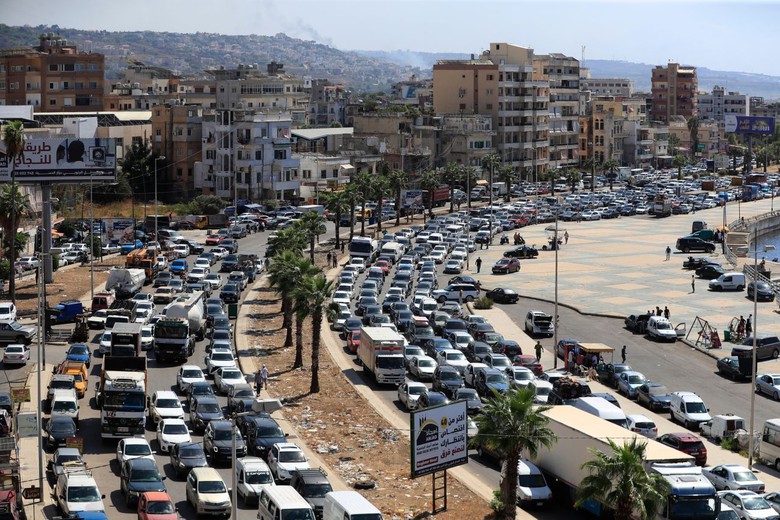 Người d&acirc;n Lebanon hoảng loạn tột c&ugrave;ng sau đợt kh&ocirc;ng k&iacute;ch chết ch&oacute;c của Israel- Ảnh 1.