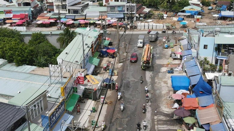 Thi c&ocirc;ng cầu Tăng Long, chủ đầu tư khắc phục hư hỏng hạ tầng l&acirc;n cận- Ảnh 1.