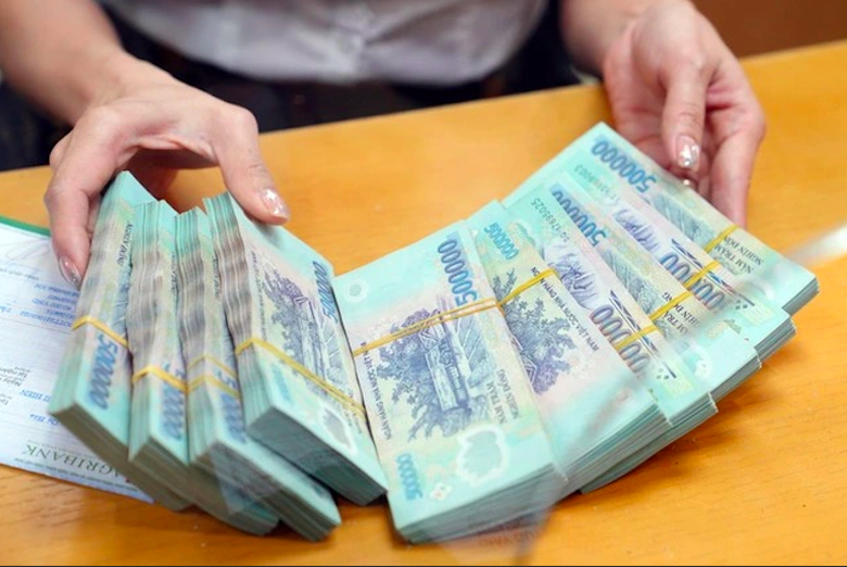 Đổi tiền mới "cắt" ph&iacute; sẽ bị xử l&yacute; ra sao?- Ảnh 2.