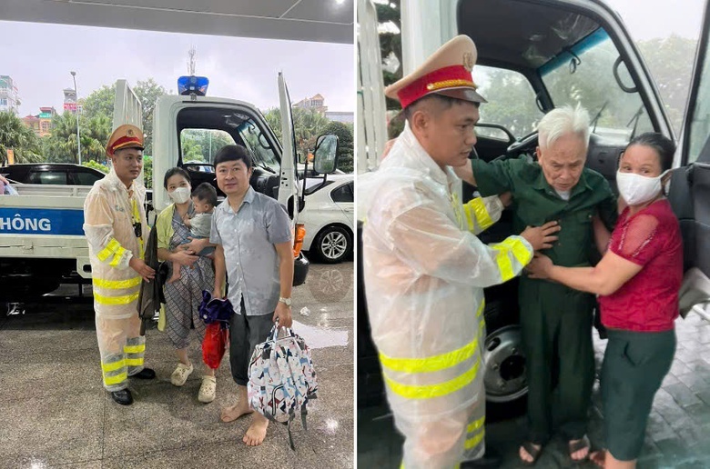 C&ocirc;ng an H&agrave; Nội dầm mưa ph&acirc;n luồng, hỗ trợ người d&acirc;n qua v&ugrave;ng ngập- Ảnh 1.