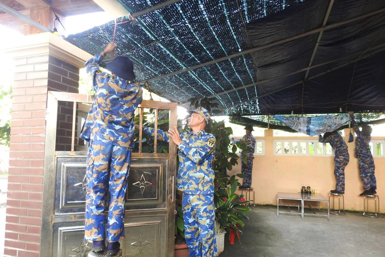 Bộ đội Trường Sa chủ động ứng ph&oacute; với b&atilde;o số 13- Ảnh 1.