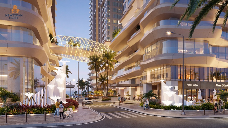 A street with a bridge over a street with buildings and palm trees  AI-generated content may be incorrect.