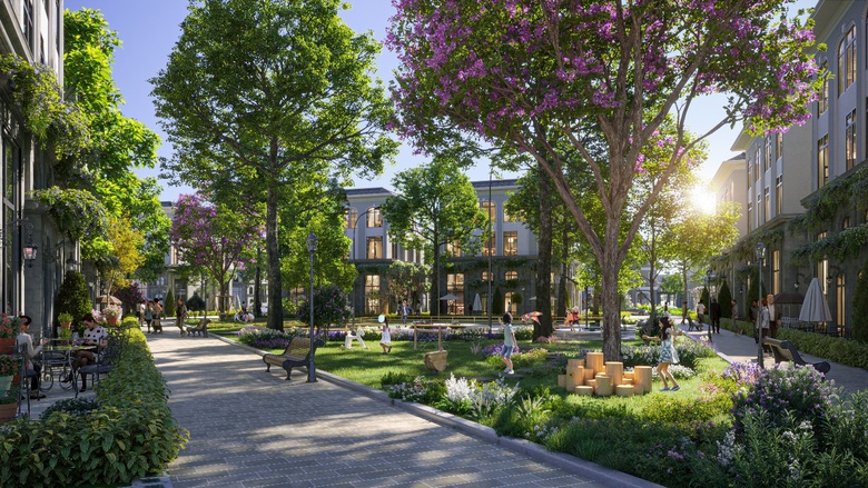 A park with trees and buildings  Description automatically generated