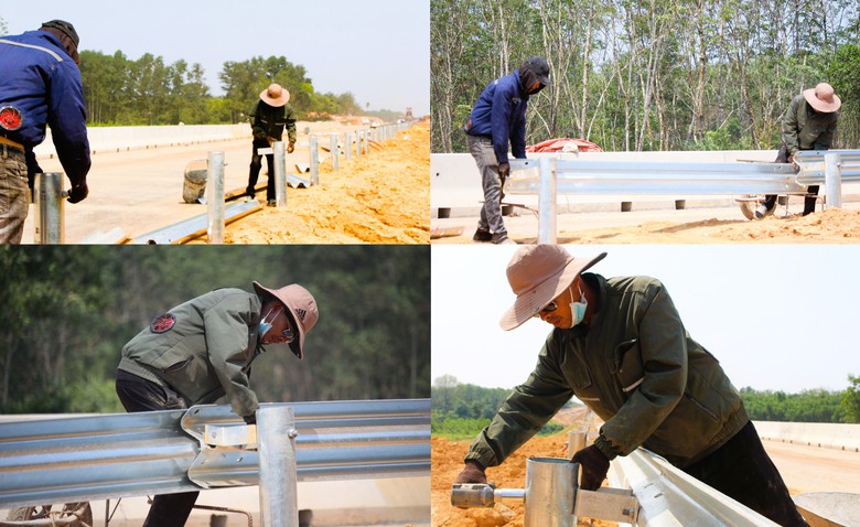 Công nhân đội nắng hoàn thiện hạng mục an toàn giao thông cao tốc Vạn Ninh - Cam Lộ- Ảnh 4. Công nhân đội nắng hoàn thiện hạng mục an toàn giao thông cao tốc Vạn Ninh - Cam Lộ- Ảnh 4.