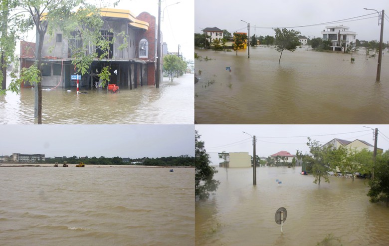 Nước lũ bủa v&acirc;y ở thị x&atilde; Quảng Trị, người d&acirc;n vất vả lội lụt, di chuyển bằng thuyền- Ảnh 13.