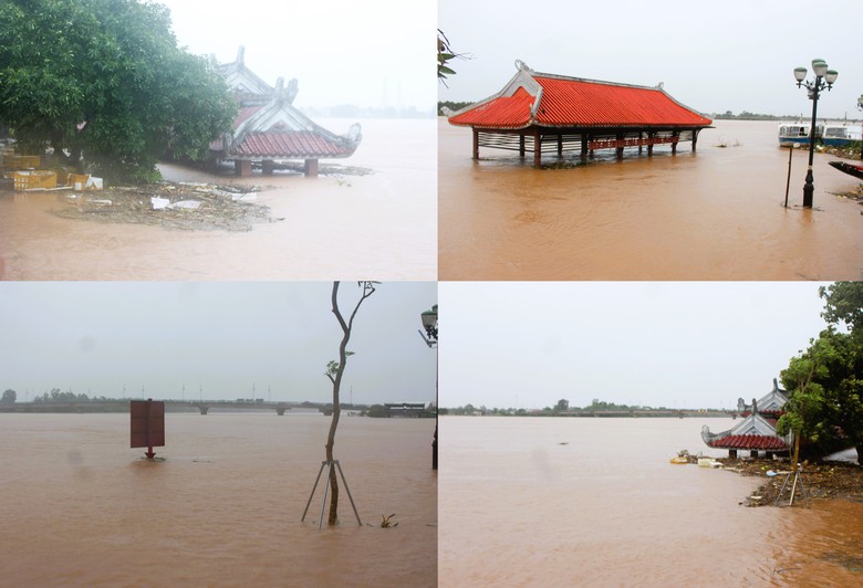 Nước lũ bủa v&acirc;y ở thị x&atilde; Quảng Trị, người d&acirc;n vất vả lội lụt, di chuyển bằng thuyền- Ảnh 6.