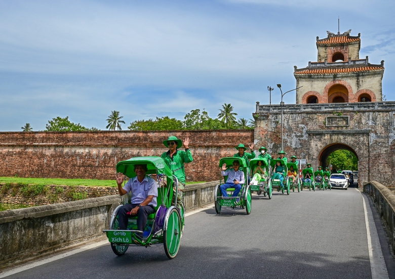 Ch&iacute;nh thức thử nghiệm dịch vụ Grab x&iacute;ch l&ocirc; tại Huế- Ảnh 1.