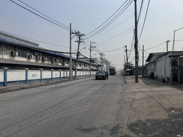 Sau phản &aacute;nh của B&aacute;o X&acirc;y dựng, đường v&agrave;o Cảng T&acirc;n Thuận được sửa chữa, lưu th&ocirc;ng an to&agrave;n- Ảnh 4.