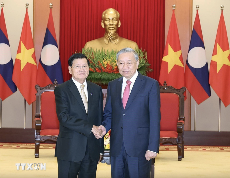 Tổng B&iacute; thư T&ocirc; L&acirc;m ch&uacute;c mừng Tổng B&iacute; thư Đảng Nh&acirc;n d&acirc;n c&aacute;ch mạng L&agrave;o- Ảnh 1.