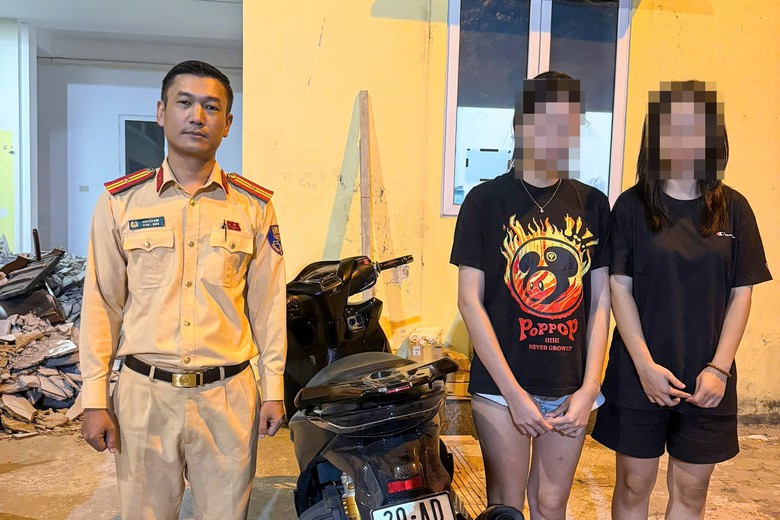 Hà Nội: Hai cô gái đi xe SH lạng lách bị phạt hơn 23 triệu đồng, chủ xe cũng bị phạt nặng- Ảnh 1.