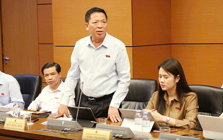 Minister Tran Hong Minh calls for decentralization to speed expressway projects- Ảnh 1.