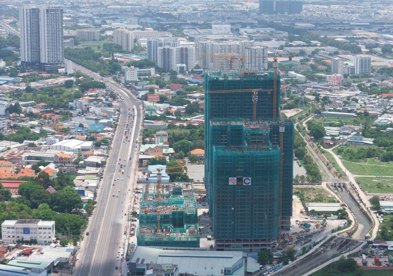 Diện mạo mới của quốc lộ 13 sau khi mở rộng l&ecirc;n 8 l&agrave;n xe - Ảnh 1.