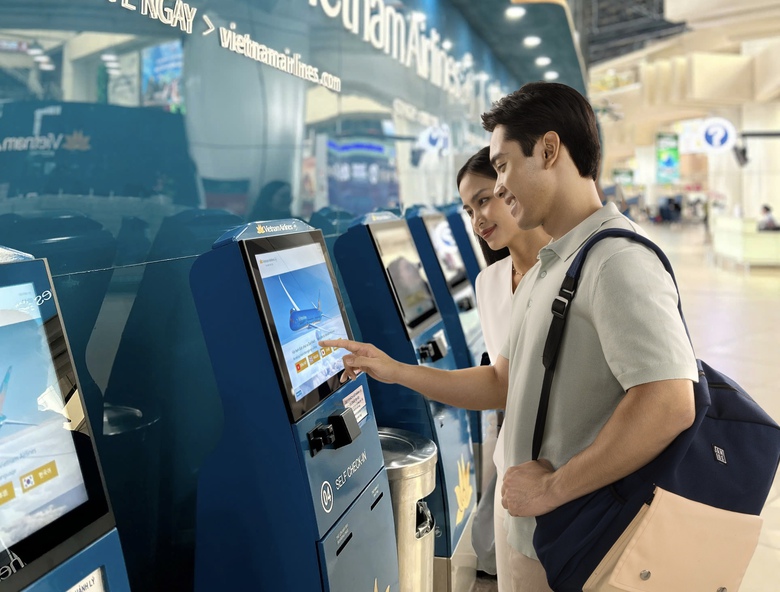 Check-in online v&agrave; sinh trắc học gi&uacute;p r&uacute;t ngắn thời gian l&agrave;m thủ tục bay m&ugrave;a h&egrave; - Ảnh 1.