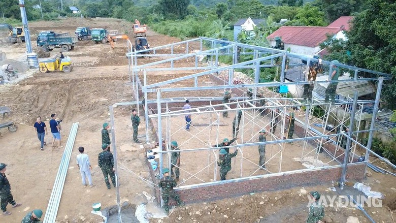 Những ngôi nhà mới khu tái định cư cho người dân Mường Thang đang thành hình? - Ảnh 3.
