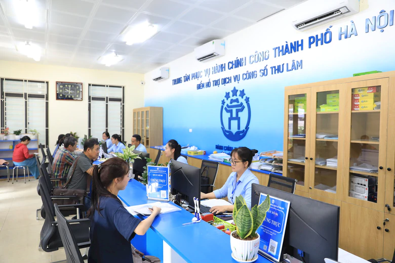 Hà Nội: Chính quyền 2 cấp chuyển mạnh sang quản trị số, phục vụ dân - Ảnh 3.