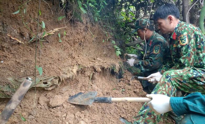 To&agrave;n cảnh chiến dịch t&igrave;m kiếm, quy tập h&agrave;i cốt liệt sỹ ở Quảng Ng&atilde;i - Ảnh 1.