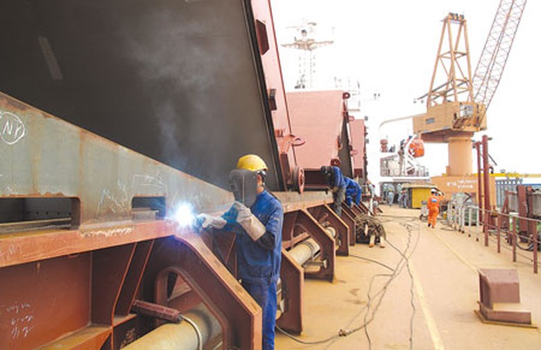 Với việc t&aacute;i cơ cấu lao động, ri&ecirc;ng trong 8 th&aacute;ng đầu năm 2014, SBIC đ&atilde; giảm được 2.840 ngườiẢnh: Ho&agrave;i L&acirc;m