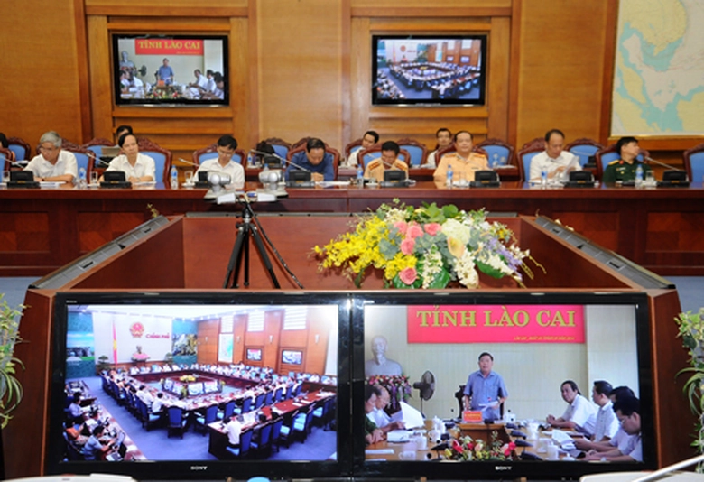 Ph&oacute; Chủ tịch tỉnh L&agrave;o Cai b&aacute;o c&aacute;o tại hội nghị trực tuyến