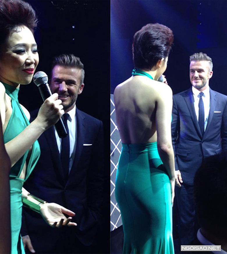 Becks mỉm cười khi T&oacute;c Ti&ecirc;n giới thiệu anh với với c&aacute;c fan. Ng&ocirc;i sao một thời lịch thiệp v&agrave; tươi tắn nhưng kh&ocirc;ng n&oacute;i chuyện giao lưu với mọi người. 