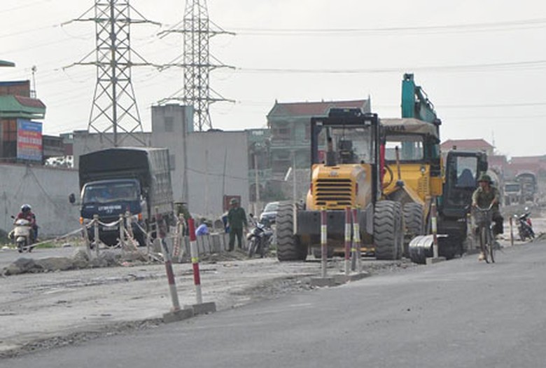 Dự &aacute;n mở rộng QL1 sẽ thi c&ocirc;ng cả trong dịp Tết &Acirc;m lịch v&agrave; dương lịch Ảnh: Xu&acirc;n Đo&agrave;n