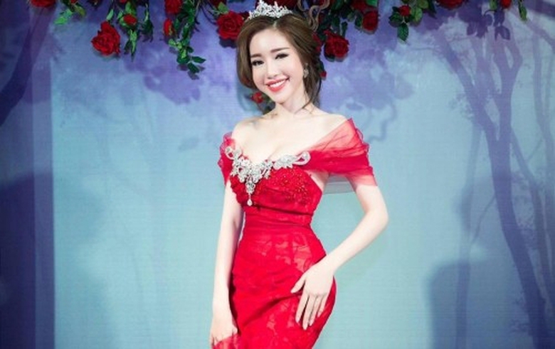 1460336425-elly-tran-lan-dau-khoe-vong-eo-54-khien