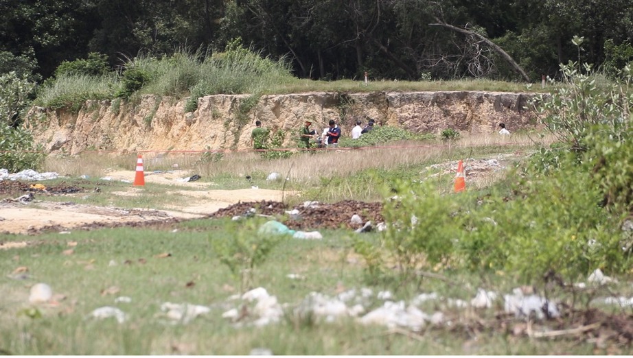 Điều tra vụ người đ&agrave;n &ocirc;ng chết ch&aacute;y trong b&atilde;i đất trống ở B&igrave;nh Dương - Ảnh 1.