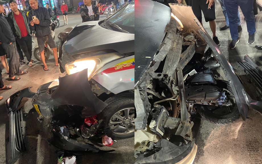 Ô tô lao như điên hất văng xe máy dừng chờ đèn đỏ làm hai người bị thương- Ảnh 1. Ô tô lao như điên hất văng xe máy dừng chờ đèn đỏ làm hai người bị thương- Ảnh 1.