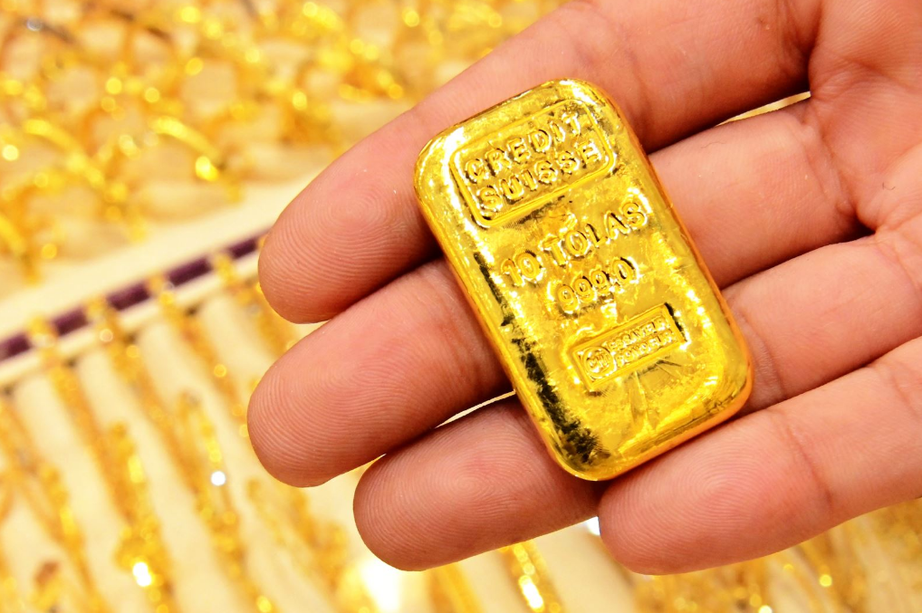 Vàng miếng SJC giảm giá sau phiên đấu thầu lần thứ 7- Ảnh 1. Vàng miếng SJC giảm giá sau phiên đấu thầu lần thứ 7- Ảnh 1.