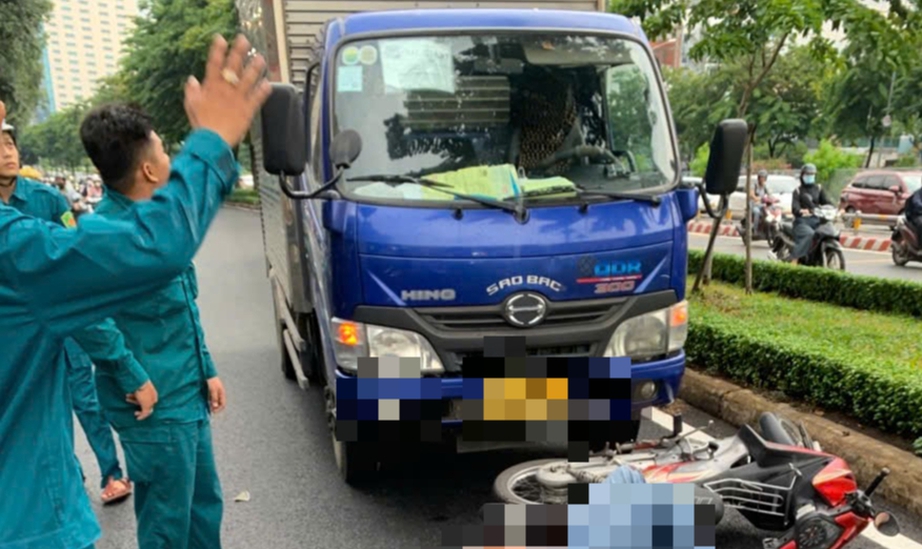 Truy t&igrave;m t&agrave;i xế t&ocirc;ng tr&uacute;ng hai cha con đi xe m&aacute;y ở TP.HCM rồi bỏ trốn- Ảnh 1.