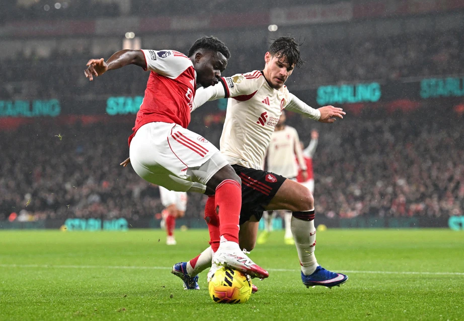 Ngoại hạng Anh: Liverpool h&ograve;a kịch t&iacute;nh Arsenal- Ảnh 1.