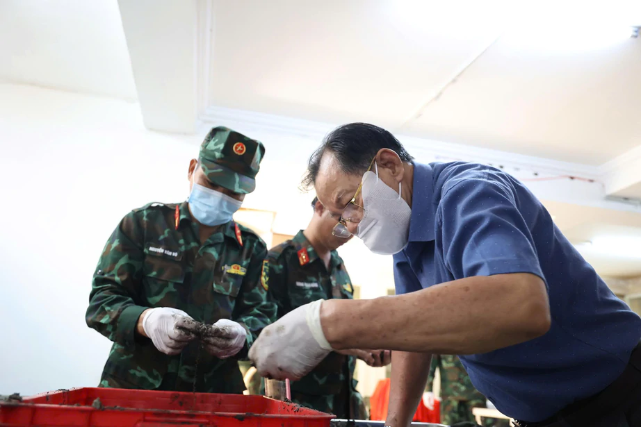 TP.HCM: Ph&aacute;t hiện th&ecirc;m 13 h&agrave;i cốt liệt sĩ, t&igrave;m thấy nhiều kỷ vật sau gần 60 năm - Ảnh 10.