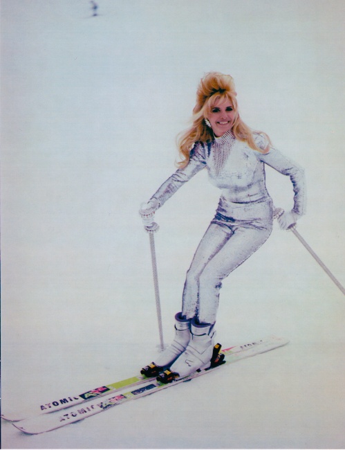 B&agrave; c&oacute; t&ecirc;n khai sinh l&agrave; Ivana Marie Zelnickova, sinh năm 1949, ở Gottwaldov thuộc Tiệp Khắc cũ, một thị trấn gần Prague (thủ đ&ocirc; Cộng h&ograve;a S&eacute;c hiện nay) v&agrave; b&acirc;y giờ được gọi l&agrave; Zlin. B&agrave; Ivana đ&atilde; gi&agrave;nh cả tuổi thanh xu&acirc;n tham gia nhiều cuộc thi đấu trượt tuyết cho hệ thống quốc gia Tiệp Khắc. Sau đ&oacute;, b&agrave; thi v&agrave;o Đại học Charles ở Prague, theo học bằng thạc sĩ về gi&aacute;o dục thể chất v&agrave; ng&ocirc;n ngữ. Sau đại học, b&agrave; đi theo tiếng gọi của t&igrave;nh y&ecirc;u với nh&agrave; trượt băng chuy&ecirc;n nghiệp George Syrovatka v&agrave; chuyển tới Canada sinh sống, trở th&agrave;nh người mẫu cho c&ocirc;ng ty Audrey Morris tại Montreal.