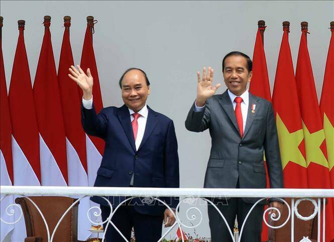 Chủ tịch nước Nguyễn Xu&acirc;n Ph&uacute;c v&agrave; Tổng thống nước Cộng h&ograve;a Indonesia Joko Widodo. Ảnh: Thống Nhất/TTXVN