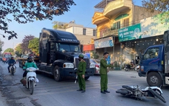 Tạm giữ tài xế xe container chống người thi hành công vụ