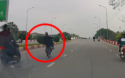 “Báo thủ” đầu trần lái xe máy, bốc đầu như “diễn xiếc”