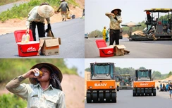 Hối hả thảm bê tông nhựa cao tốc Vạn Ninh - Cam Lộ giữa cái nắng cháy da