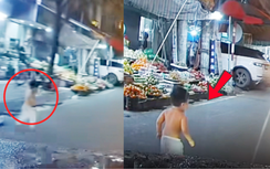 Bé trai bất ngờ chạy ra đường, suýt bị ô tô đâm
