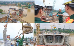 Những nhịp dầm đang vươn ra sông Hồng, cầu Phong Châu dần thành hình