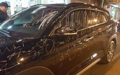 Đỗ xe bị xịt sơn, bôi bẩn báo ai xử lý?