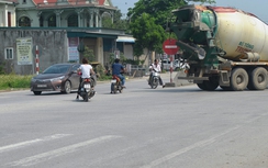Có nên mở dải phân cách QL1 ngăn dân đi ngược chiều?