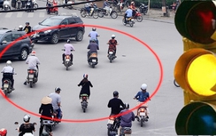Thấy đèn vàng vẫn cố vượt, bị phạt bao nhiêu?
