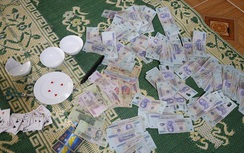 19 người đang sát phạt bị bắt, chiếu bạc toàn mệnh giá 500.000