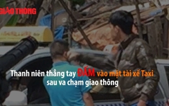 Tài xế taxi đứng im chịu đòn sau va chạm giao thông