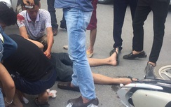 Phanh gấp tránh xe máy, người bất tỉnh, người chảy máu đầu